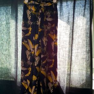 Blue Blush Navy blue dress pants with yellow flora